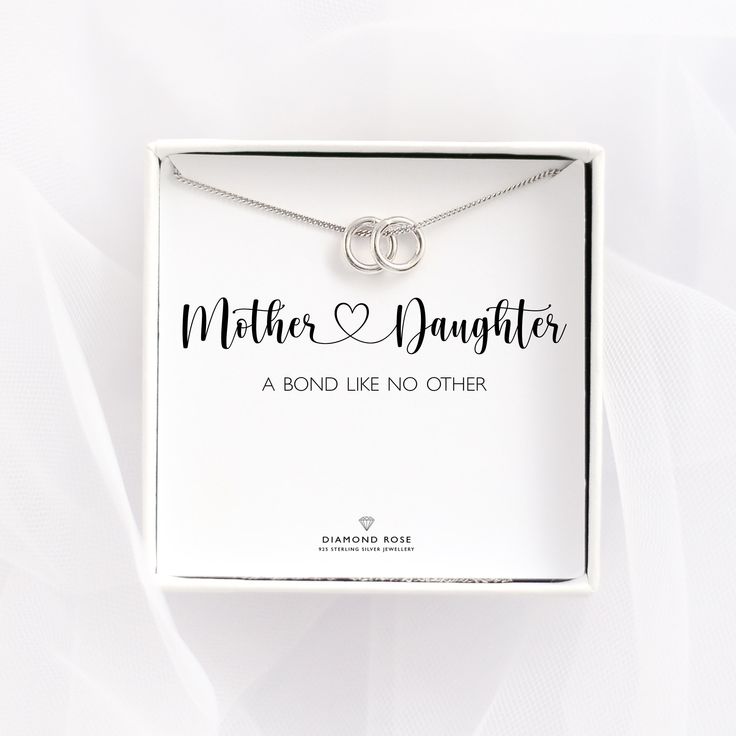 "Celebrate the unbreakable bond between mother and daughter with our timeless Mother & Daughter Bond Necklace. Adorned with delicate rings, each representing the infinite love and connection shared in this special relationship, this necklace is a perfect tribute to the enduring bond that grows and strengthens over time. Crafted with elegance and simplicity, this necklace serves as a daily reminder of the love, support, and shared memories between mother and daughter, making it a cherished accessory for both. Each necklace comes with a heartfelt card reading, \"Mother and Daughter: A Bond Like No Other,\" making it an exquisite gift that expresses the depth of this unique relationship. DETAILS ∙ choose how many rings you want to have on the necklace  ∙ made entirely from 925 sterling silver Mother's Day Wedding Necklace With Gift Box, Meaningful Hallmark Jewelry For Mother's Day, Wedding Jewelry Gift Box For Mother's Day, Mother's Day Wedding Jewelry In Gift Box, Father's Day Silver Jewelry Gift Box, Elegant Anniversary Jewelry Gift Wrapped, Silver Jewelry With Gift Box For Father's Day, Elegant Jewelry For Anniversary, Gift Wrapped, Valentine's Day Anniversary Gift Wrapped Jewelry