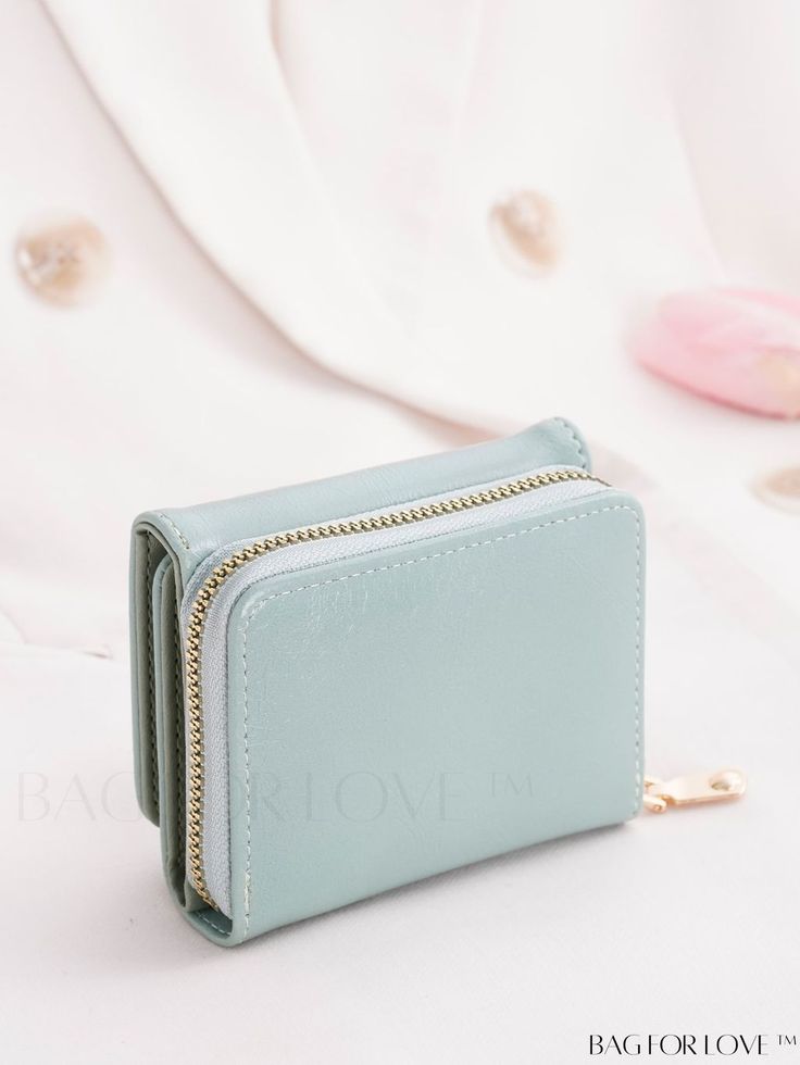 BagForLove - Womens Small Bifold Wallet with Stitch Detail, Coin Pocket, and Zipper Closure Product Description Color Mint Green Coating 100% Polyurethane Composition 100% Polyurethane Pattern Type Plain Type Small Wallet Style Fashionable Material PU Size Chart INCH CM Bag Height Bag Width Bag Length 3.5 inch 1.6 inch 3.9 inch Bag Height Bag Width Bag Length 9 cm 4 cm 10 cm Details Pictures Similar Products h2 { text-align: center; } /* æ¢è¡ */ li{ white-space: normal; word-break: break-all; Green Bifold Coin Purse With Zipper Closure, Casual Green Wallet With Zipper Closure, Casual Bifold Bag With Zipper Closure, Check Background, Inch Bag, Brown Babies, Details Pictures, Elegant Pattern, Word Wrap