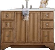 a bathroom vanity with drawers and a sink