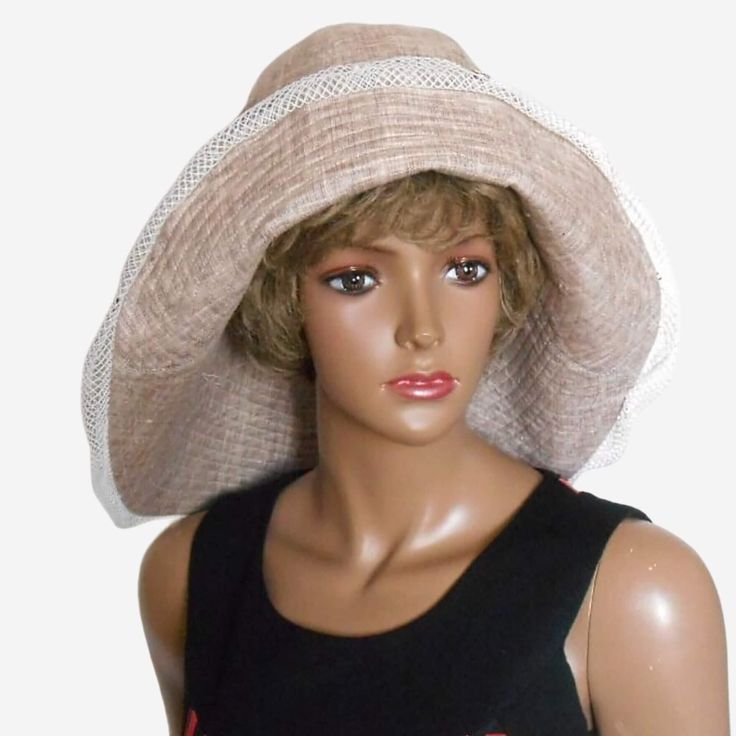 Size 57 cm. The hat is made of eco-friendly breathable linen fabric with a melange effect. Hat with asymmetrical brim. The back brim of the hat is wider than the front. The hat is decorated with mesh fabric and small decorative shells. Summer linen wide-brimmed sun hat in beige color. Hat with cotton lining. Lightweight Wide Brim Hat For Beach Season, Lightweight Wide Brim Hat For Beach, Lightweight Wide Brim Hat For The Beach, Lightweight Beige Hat With Curved Brim, Lightweight Beige Sun Hat For Summer, Lightweight Wide Brim Straw Hat For Beach, Beige Brimmed Panama Hat For Warm Weather, Lightweight Beige Wide Brim Panama Hat, Lightweight Straw Hat With Curved Brim