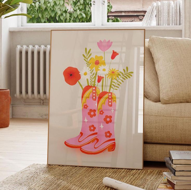 an image of a pink boot with flowers in it on the floor next to a couch