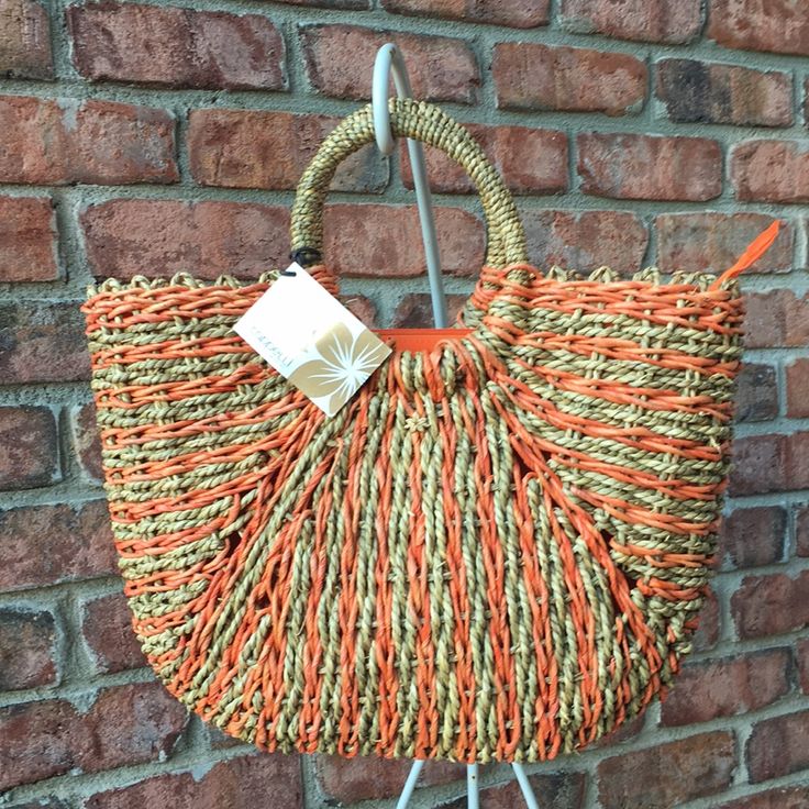 Nwt Cappelli Straworld Purse Tote Bag Straw Beach Cruise Bohemian Lined Orange Color: Orange Zip Top Closure/Orange Lining New With Tag Purchased Off Of Dorfman-Pacific.Com See Photos Material: Straw Great For Travel To A Beach Or Cruise Setting And Beautiful Orange Color! Approximate Measurements: Height: 10" Width Across Bottom: 11.5" Depth: 4" Tote Handles: 4-5" Casual Beach Bag In Bucket Shape, Casual Bucket Shape Beach Bag, Adjustable Brown Shoulder Bag For Beach, Casual Adjustable Straw Beach Bag, Casual Adjustable Straw Bag For Beach, Adjustable Straw Bag For Vacation, Adjustable Casual Straw Bag For Beach, Casual Orange Beach Bag For Vacation, Adjustable Bag For Beach In Spring