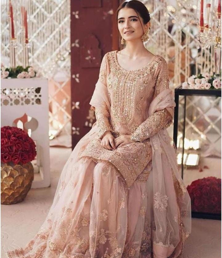 "Explore our stunning collection of Pakistani and Indian wedding dresses and formals. Featuring our Desi Designersjorray  Nikkah Garara, Shalwar Kameez, Anarkali Suits, Sharara Suits, Gharara Suits, Lehenga Choli, Long Gowns and Designer Sarees. Shop online for the latest Pakistani and Indian bridal wear, perfect for your special day. Get ready to shine in our elegant and affordable dresses, designed to make you look Fabulous. Whether you're in the UK or USA, our Pakistani and Indian wedding dre Net Garara Design, Nikkah Garara, Net Garara, Pink Lehenga Bridal, Suits Sharara, Gharara Suits, Sharara Suits, Long Gowns, Pakistani Wedding Dress