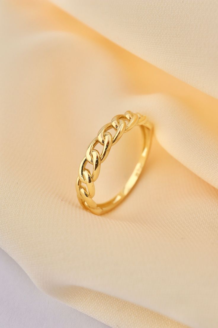 Gold Chain Ring - Chain Ring- Chunky Ring - Everyday Ring - Minimalist Wedding Band- Curb Chain Ring - Cuban Link Rink- Gift For Her This solid gold dainty ring is made entirely from 14k solid gold. * Jewelry is packaged and shipped in a delicate jewelry gift box. * If you are purchasing it as a gift, please feel free to add a personal note. Anniversary, Gift For Wife, Christmas Gift Gold Kt: 14K solid gold * Available Gold Color:  * Guaranteed Authentic 14k Gold, Not Plated Or Filled * Stamp: 1 Curb Chain Ring, Elegant Open Chain Ring With Adjustable Chain, Elegant Yellow Gold Chain Rings, Elegant 14k Gold Rings With Chain Detail, Elegant Open Ring Jewelry With Gold Chain, Elegant Rings With Gold Chain For Gift, Elegant 14k Gold Ring With Chain Detail, Elegant Yellow Gold Round Band Chain Ring, Elegant Gold Plated Open Chain Ring