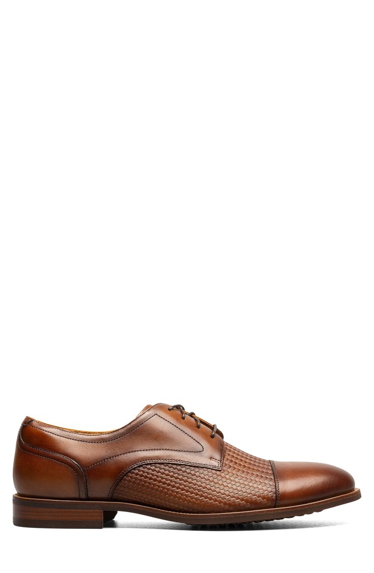 Mixed textures and a cap toe lend visual intrigue to a sophisticated leather derby grounded by a cushioned footbed and flexible rubber sole. Lace-up style Cushioned footbed Leather upper/textile lining/rubber sole Imported Cognac Leather Cap Toe Shoes For Derby, Brown Cap Toe Derby With Leather Sole, Brown Leather Sole Cap Toe Derby, Cognac Oxfords With Leather Sole For Derby, Cognac Oxfords With Leather Sole, Cognac Goodyear Welted Dress Shoes For Derby, Brown Cap Toe Derby With Goodyear Welt, Brown Cap Toe Derby With Goodyear Welted, Brown Cap Toe Derby In Calf Leather