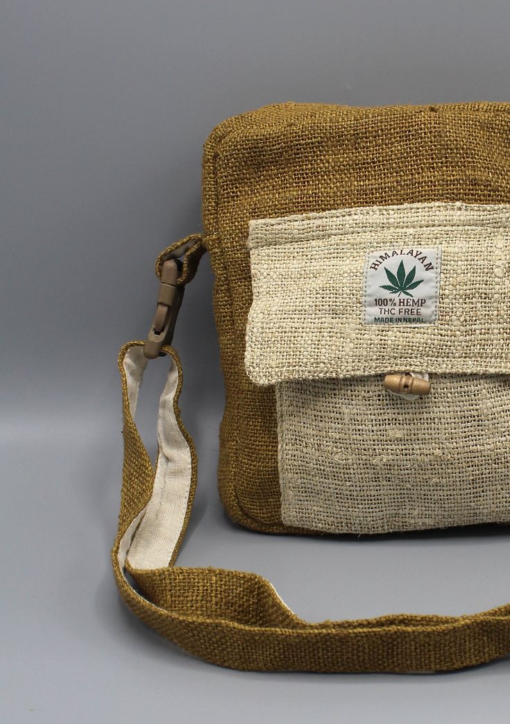 Eco-friendly Khaki Shoulder Bag For Travel, Beige Bags With Adjustable Strap For Outdoor, Eco-friendly Bag With Adjustable Strap For Outdoor, Eco-friendly Canvas Travel Bag With Adjustable Strap, Travel-friendly Eco-friendly Canvas Bag With Adjustable Strap, Eco-friendly Travel Canvas Bag With Adjustable Strap, Eco-friendly Outdoor Bag With Adjustable Strap, Casual Natural Shoulder Bag With Pockets, Eco-friendly Beige Crossbody Shoulder Bag