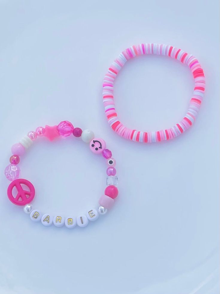 Set of two bracelets; pink; Barbie Pink Round Beads Charm Bracelet For Friendship, Pink Charm Bracelet With Round Beads For Friendship, Pink Beaded Charm Bangle Bracelet, Pink Beaded Bangle Charm Bracelet, Pink Wristband With Letter Beads As Gift, Adjustable Pink Charm Bracelet With Letter Beads, Trendy Pink Beaded Charm Bracelet, Personalized Pink Bracelets With Round Beads, Pink Adjustable Charm Bracelet For Friendship