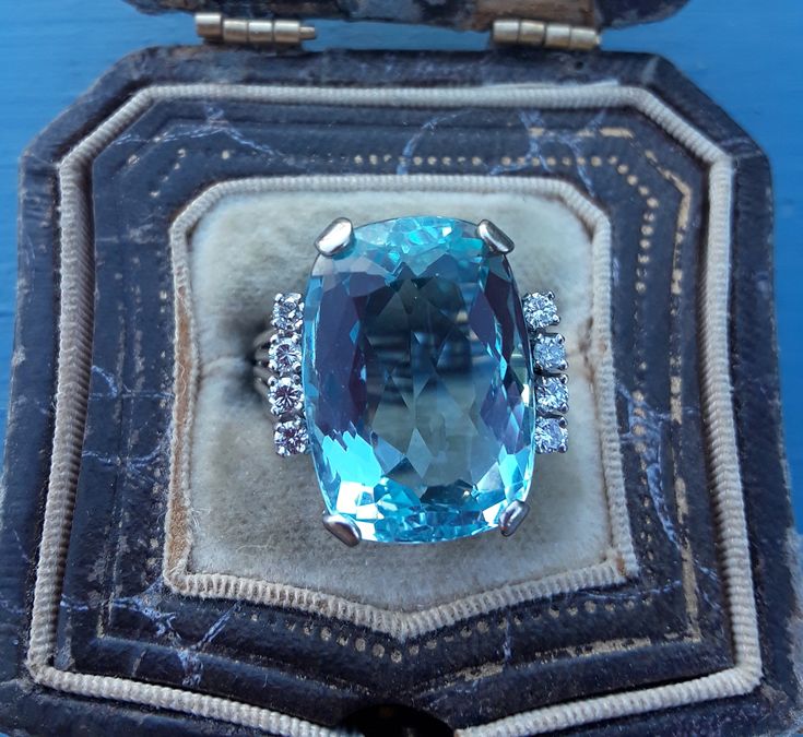 Absolutely Stunning 14k White Gold Diamond Aquamarine ring... Perfect Vintage Pre Owned Condition. Size 5, sizable. Weight 9.05 Grams. Color of Aquamarine is light to Medium blue, in depend on lighting. Aquamarine is about 18mm x 13mm.. Some Pics ENLARGED to see details. check Measurements please. all sales are final. Antique Box for Display Only. Gold and diamonds was tested by jeweler. Elegant Gemstones With Diamond Accents For Wedding, Elegant Wedding Gemstones With Diamond Accents, Luxury Diamond Gemstones For Wedding, Luxury Cushion Cut Gemstones For Wedding, Wedding Fine Jewelry Gemstones With Diamond Accents, Fine Jewelry Gemstones With Diamond Accents For Wedding, Elegant Cushion Cut Gemstones For Wedding, Elegant Emerald Cut Gemstones For Wedding, Luxury Hallmarked Topaz Ring For Formal Occasions