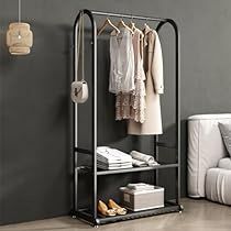 a clothes rack in the corner of a room