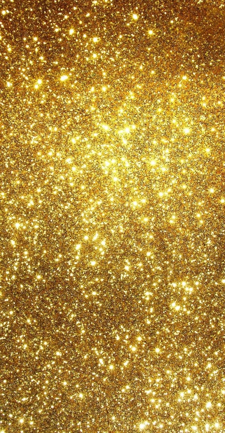 gold glitter background with lots of small stars