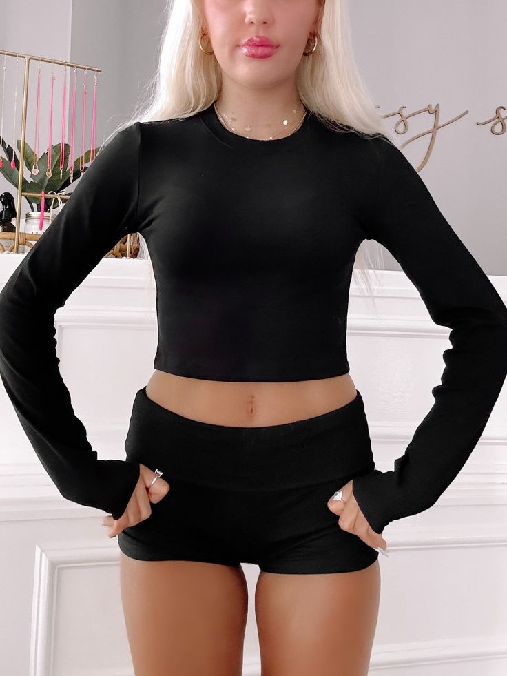 Kendall Long Sleeve Black Top | Sassy Shortcake Solid Long Sleeve Crop Top For Loungewear, Solid Color Long Sleeve Crop Top For Loungewear, Trendy Long Sleeve Solid Color Crop Top, High Stretch Long Sleeve Crop Top For Loungewear, Black Long Sleeve Crop Top For Loungewear, Long Sleeve Stretch Crop Top In Solid Color, Long Sleeve Stretch Solid Color Crop Top, Versatile Black Crop Top For Loungewear, Black High Stretch Tops For Loungewear