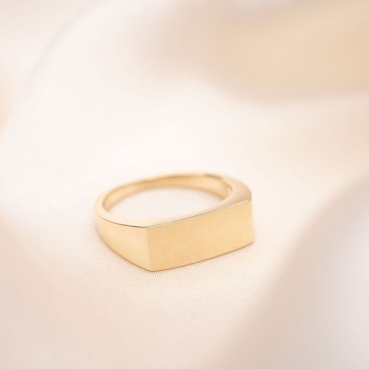 14k or 18k Solid Gold Rectangle Signet Ring For him or her. Male model is wearing a size 10. Face dimensions: 15mm x 6mm Built to last a lifetime and more. Complimentary custom engraving! Handmade to order. Please allow an additional three days for processing. Rectangular White Gold Rings Stamped 14k, Modern Gold Ring With Rectangular Stone, Classic Square Rings For Gifts, Modern Rectangular Ring As A Gift, Classic Rectangular Engraved Ring For Everyday, Classic Square Rings For Gift, Rectangular Diamond Cut 14k Gold Rings, Classic Square Ring For Gifts, 14k Gold Square Cut Promise Ring