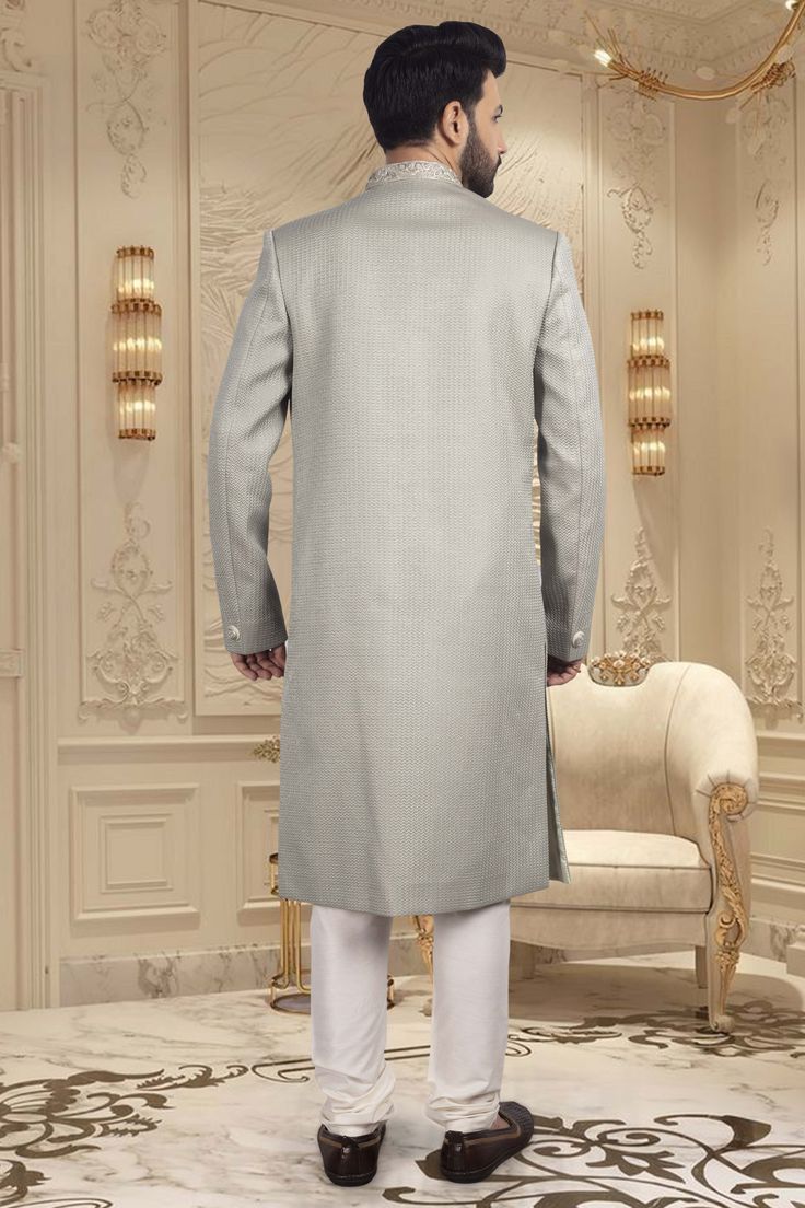 Introducing our latest masterpiece, the Mens Sherwani R14-S65. Made with a delicate pastel color, this sherwani exudes elegance and sophistication. Perfect for special occasions and formal events, this sherwani with unique design make you stand out in the crowd and elevate your style to a whole new level. Elegant Unstitched Suit For Reception, Elegant Unstitched Suit For Reception In Transitional Season, Elegant Traditional Wear With Dabka For Reception, Luxury Bandhgala For Groom, Elegant Formal Churidar With Resham Embroidery, Elegant Churidar With Traditional Drape For Reception, Elegant Sherwani With Zari Work Straight Kurta, Elegant Sherwani With Zari Work, Elegant Festive Churidar With Naqshi