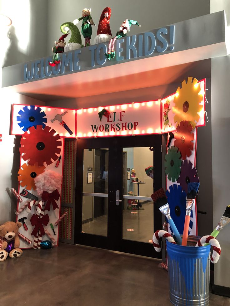 an entrance to a store decorated for christmas