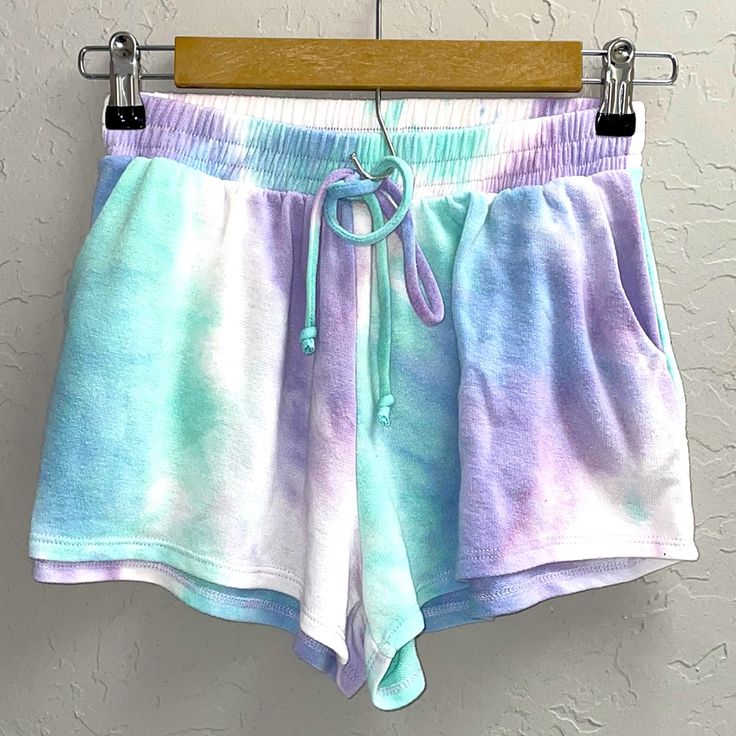 Lovely J Woman’s Purple, Blue And Green Tie- Dye Drawstring Shorts With Side Pockets Beautiful Print. Super Comfy And Soft Size Medium Great Condition- Never Worn 84% Rayon 3% Spandex 63% Polyester Summer Purple Lounge Shorts, Summer Purple Loungewear Shorts, Purple Loungewear Shorts For Summer, Summer Loungewear Purple Shorts, Summer Purple Pajama Shorts For Loungewear, Purple Pajama Shorts For Summer Loungewear, Purple Cotton Pajama Shorts For Summer, Summer Purple Relaxed Fit Shorts, Purple Relaxed Fit Shorts For Summer