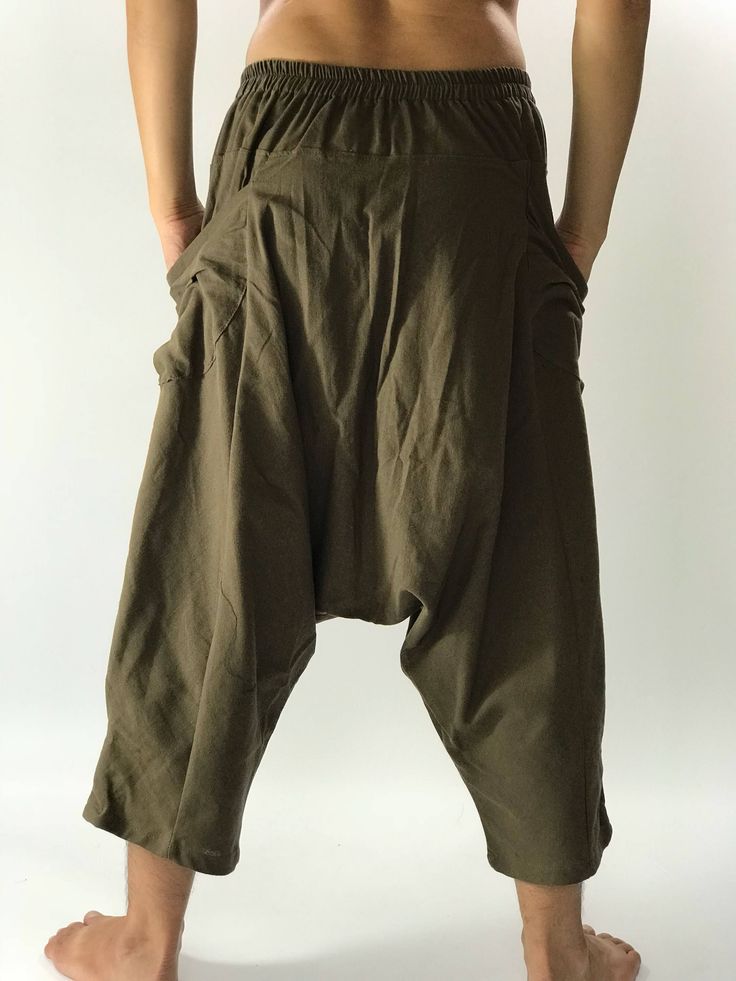 "Super soft Coconut button up cotton pants High quality and durable - Premium lCotton Samurai trousers styler are completely handmade using the best quality cotton fabric 100% super soft. The half of the waist is elastic which they are easy to take on or off. Single pocket. buttons on the side of each leg to keep the hem of each leg off the ground. Sizing: One size fits most Measurement: Waist: 26\" - 32\" Hip: up to 50\" Length: 36\" (90CMS) Shipping : - All item will be shipped in 1 business d Baggy Drawstring Wide-leg Harem Pants, Baggy Full-length Cotton Harem Pants, Non-stretch Khaki Cotton Harem Pants, Baggy Ankle-length Harem Yoga Pants, Baggy Full-length Harem Pants For Yoga, Pants With Elastic Waist, Harem Pant, Womens Pants, Cotton Pants