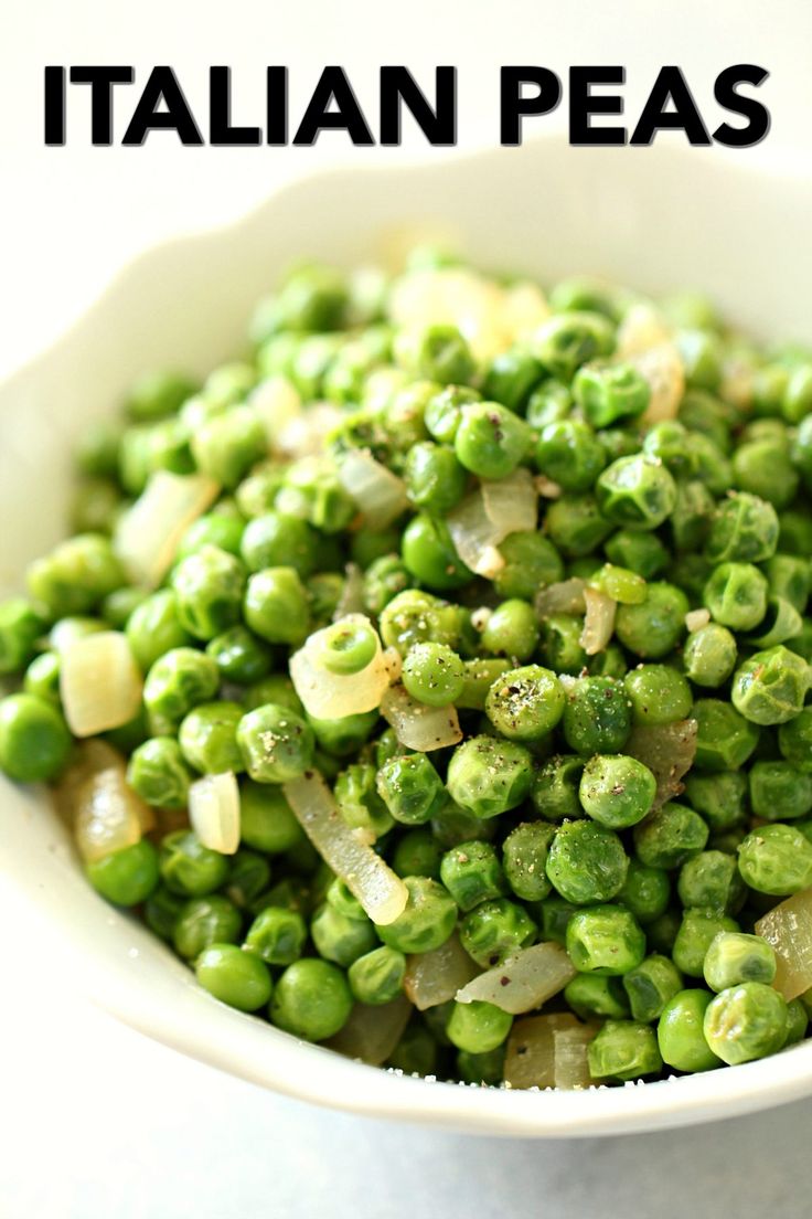 a white bowl filled with peas and onions