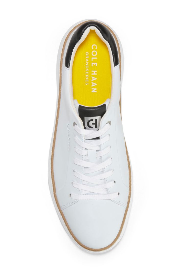 This sleek leather sneaker with clean lines inspired by classic tennis styles has rubber caps on the toe and heel for added traction. Soft and flexible, this low-top silhouette is outfitted with signature GrandOS technology for comfort without compromise. Lace-up style Removable insole Leather upper/textile lining/rubber sole Imported Men's Shoes Classic White Low-top Golf Shoes, Classic Low-top Golf Shoes With Rubber Sole, Classic Low-top Golf Shoes With Cushioned Footbed, Classic Low-top Cushioned Golf Shoes, Classic Lace-up Tennis Sneakers, Classic Low-top Golf Shoes With White Sole, Classic Low-top Golf Shoes, Golf Shoes With White Contrast Sole And Round Toe, Low-top Golf Shoes With Rubber Sole And White Sole