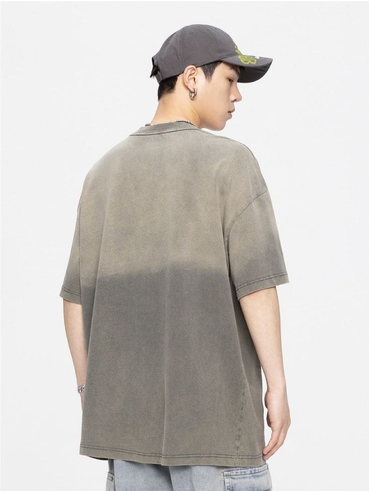 GTRG cotton short sleeve shirt, gradient effect and fading throughout, rib knit crewneck, dropped shoulders, text printed at front. Composition - 100% Cotton Asian Sizing: Size Up 1 Size For US/EU Fit Size Up 2 Sizes For US/EU Oversized Fit Model: 180cm/56kg 5’11/123lbs wearing size XL Oversized Tie Dye Tops With Letter Print, Trendy Faded T-shirt For Streetwear, Faded T-shirt For Summer Streetwear, Casual Tie Dye Tops For Streetwear, Faded Soft-washed T-shirt For Streetwear, Gray Short Sleeve Distressed T-shirt, Spring Faded Crew Neck T-shirt, Faded Relaxed Fit Short Sleeve Tops, Casual Oversized Faded Tops