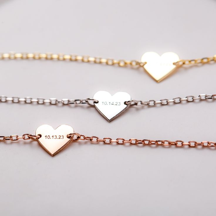 Engraved Heart-Shaped Bracelet - A Custom Tale of Love & Memories Personalize your bracelet by adding your initials, name, or a special date. Crafted with care, this heart-shaped bracelet is the perfect way to express your love and affection. Wear it as a reminder of a special moment or person in your life. WHAT MAKES IT SPECIAL A cute heart shape that speaks volumes. Sturdy and pretty at the same time. Personalize it with dates, initials, or symbols that are meaningful to you. Our expert team e Silver Heart-shaped Name Bracelet For Personalized Gift, Silver Heart Name Bracelet For Personalized Gift, Double Heart Bracelet Valentine's Day Gift, Personalized Silver Name Bracelet With Heart Shape, Elegant Personalized Heart Bracelet With Name, Minimalist Personalized Heart Bracelet For Mother's Day, Valentine's Day Double Heart Friendship Bracelet, Engraved Heart Bracelet As A Personalized Gift, Heart Charm Bracelet For Anniversary And Mother's Day