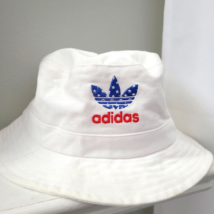 Step Out In This Vintage Style Adidas Bucket Hat. One Size Fits Most. New Without Tags Adidas Casual Adjustable Bucket Hat, Adidas Adjustable Casual Bucket Hat, Adidas Cotton Hat With Curved Brim, Adidas Cotton Hats With Curved Brim, Adjustable Adidas Cotton Hat, White Flat Brim Bucket Hat For Streetwear, White Retro Bucket Hat With Curved Brim, White Cotton Bucket Hat One Size, Adidas Cotton Summer Hats