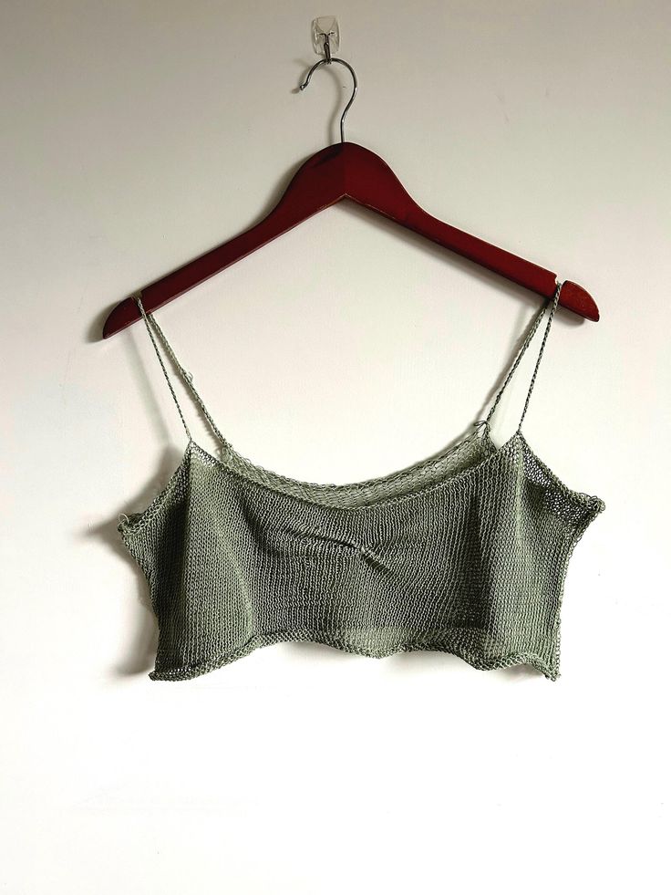 The knit sage coquette tank was handmade on the knitting machine. This piece is a beautiful piece that can be worn on a plain white t, over your cute bralette, or at the beach/River as a cover up. This price was machine knit by shop member Josie. Sage Coquette, Plain White T's, Womens Tank Tops, Machine Knit, Knitting Machine, Plain White, Machine Knitting, Modern Fashion, Crop Tank