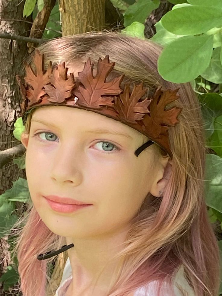 Frolic in the forest with this Sylvan crown, adorned with hand-tooled leather oak leaves. The headband is backed with a layer of fabric and ties in the back with a leather lace.  Perfect for cosplay, Renaissance Faires, or just running through the woods. Running Through The Woods, Woodland Crown, Decorative Hair Pins, Leather Crown, Leather Headbands, Medieval Costume, Oak Leaves, Hand Tooled Leather, Turban Headbands