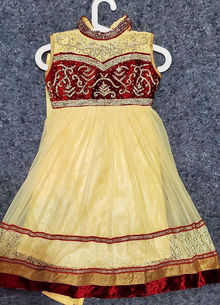 Kids long dress chudithar with attached short sleeves tagged in the inside of the dress. The Indian standard size is 32 to 34 inches. Comes with attached chudithar pant and dupatta. The top half maroon material is velvet and the bottom half skirt material is mesh layers. Perfect for any Indian festivities. Kids Long Dress, Long Frocks For Kids, Long Frock, Long Frocks, Half Skirt, Womens Clothing Tops, Favorite Outfit, Long Dress, The Dress