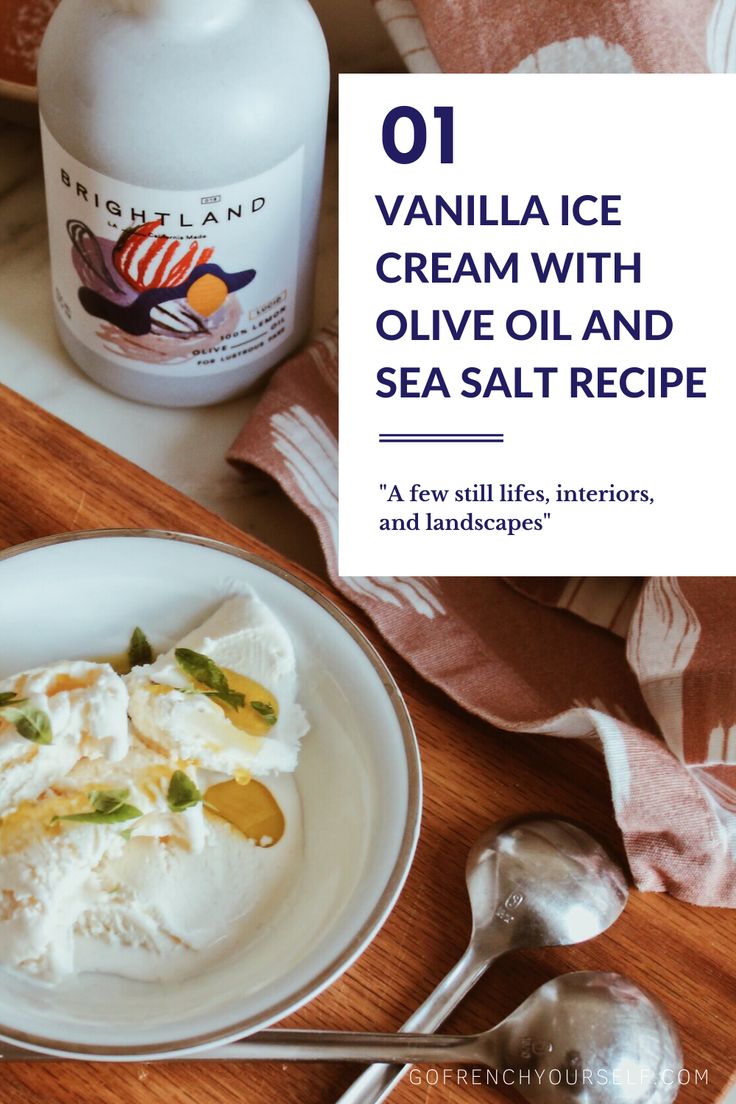 vanilla ice cream with olive oil and sea salt recipe on a plate next to spoons