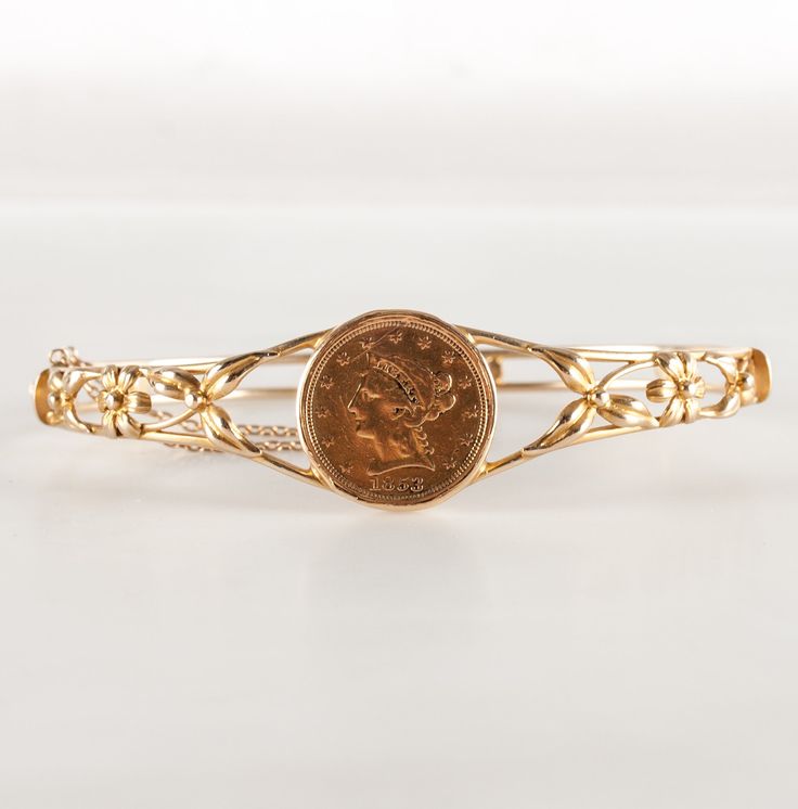 Vintage 1950's 14k Yellow Gold 1853 Liberty Head 5$ Coin Hinged Bangle BraceletMetal Information: 14k Yellow Gold / Coin Is 90% GoldTotal Weight: 18.4gBracelet Width: 18.8mmBracelet Length: 7.5"Circa: 1950'sEstimated Retail Price: $3475.00OUR PRICE: $2780.0044654 Vintage Yellow Gold Bangle Stamped 14k, Vintage 14k Stamped Yellow Gold Bangle, Vintage 14k Stamped Gold Bangle Bracelet, Vintage 14k Gold Hallmarked Bangle, Vintage 14k Gold Bangle, Vintage 14k Gold Bracelet For Anniversary, Vintage Yellow Gold Bracelets Stamped 14k, Vintage Yellow Gold Hallmarked Cuff Bracelet, Vintage Yellow Gold Bangle With Jubilee Bracelet