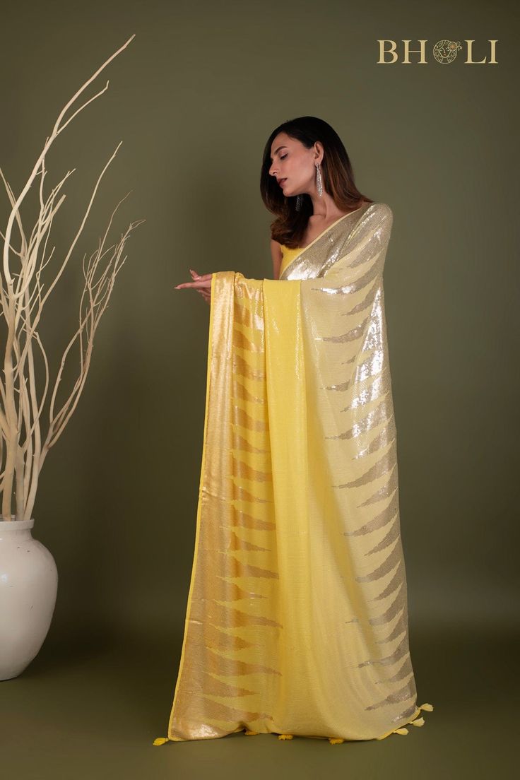 Party Sequin saree on Pure Georgette Party Wear Pre-draped Saree With Sheer Dupatta For Celebration, Pre-draped Saree With Mirror Work For Celebration, Pre-draped Saree With Dupatta For Navratri Party, Elegant Yellow Saree With Mirror Work, Navratri Saree With Sequins, Diwali Party Pre-draped Tissue Silk Saree, Yellow Bollywood Sharara With Sequins, Bollywood Style Yellow Sharara With Sequins, Pre-draped Tissue Silk Saree With Dupatta For Party