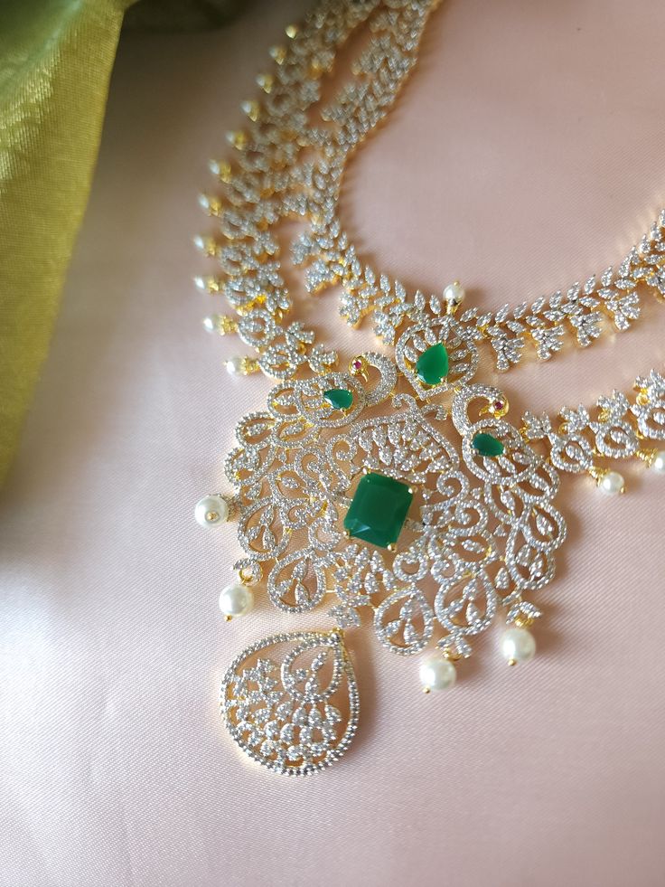 Very Pretty and Gorgeous Green CZ necklace with matching earrings.Necklace length- 20 inchesEarrings length- 2.5 inchesThese are lightweightHighest quality and craftsmanshipReady to ship from Austin, United States