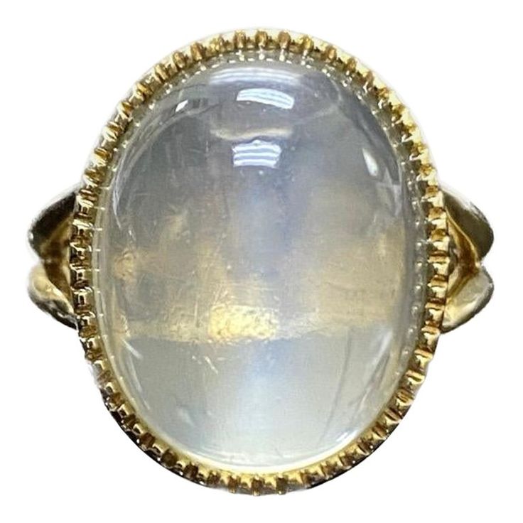 DeKara Designs Collection Art Deco Inspired Extremely Elegant Handmade Oval Cabochon Moonstone Engagement Ring. Metal- 18K Yellow Gold, .750. Stones- 1 Genuine Oval Cabochon Moonstone 19.67 Carats. Size- 8 3/4. FREE SIZING!!!! An Amazing One of a Kind Entirely Handmade Cabochon Huge Moonstone Engagement Created in 18K Yellow Gold. The ring features a beautiful high quality and clarity oval cabochon moonstone that is a whopping 19.67 carats! The moonstone is gracefully and professionally bezel set with perfection. The moonstone is surrounded by beautiful milgrain work which brings out the stone furthermore. The profile of the ring is truly amazing with flawless work that is finished with a high polish shine finish. This ring is one of a kind, and is entirely handmade. The moonstone is very Luxury Domed Cabochon Moonstone Ring, Luxury Oval Cabochons For Wedding, Luxury Spiritual Oval Cabochon Rings, Luxury White Oval Cabochon Moonstone Ring, Luxury Oval Cabochon Elegant Jewelry, Luxury Marquise Cabochon Jewelry, Luxury Rose Gold Oval Cabochon Jewelry, Moonstone Rings, Moonstone Engagement