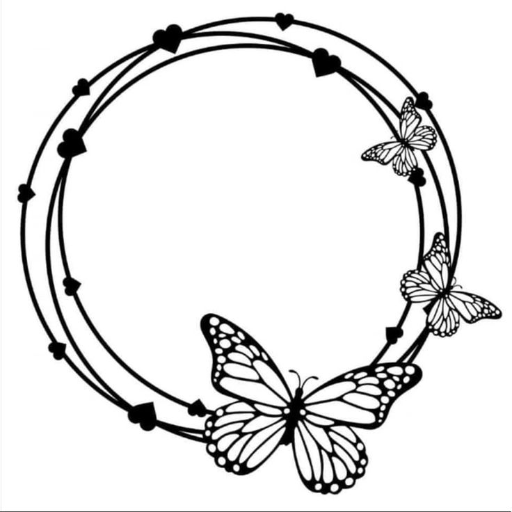 a circular frame with two butterflies on it