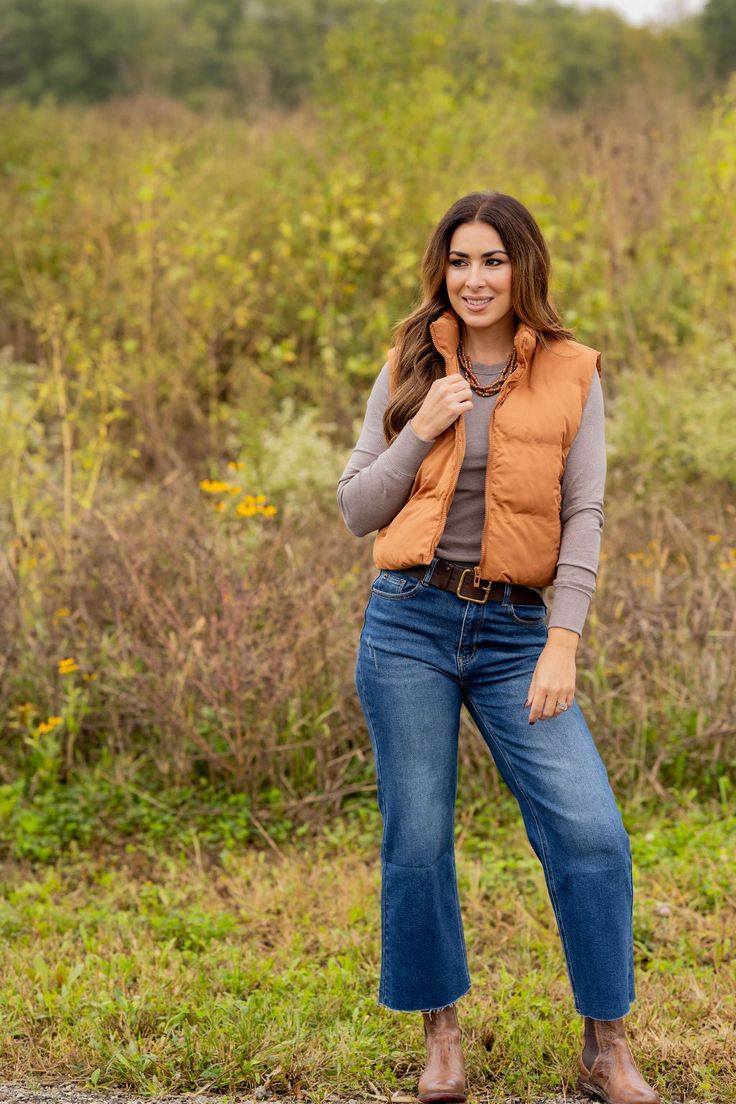 This simple vest is perfect for colder weather. Adding a vest is a quick and easy way to take your outfit to the next level of stylish! Whether you pair with a blouse, sweater, graphic crewneck, button up, or just a basic long sleeve tee, we know this will be a staple piece in your wardrobe!Shell, Lining, & Fill: 100% Polyester Machine wash cold with like colors. Line dry. Fall Sweater Vest For Layering, Winter Layering Crew Neck Vest, Versatile Winter Sweater Vest For Layering, Versatile Winter Layering Sweater Vest, Versatile Sweater Vest For Winter Layering, Fall Cotton Crew Neck Sweater Vest, Trendy Fall Sweater Vest For Everyday, Trendy Sweater Vest For Everyday Fall Wear, Trendy Sweater Vest For Fall Layering