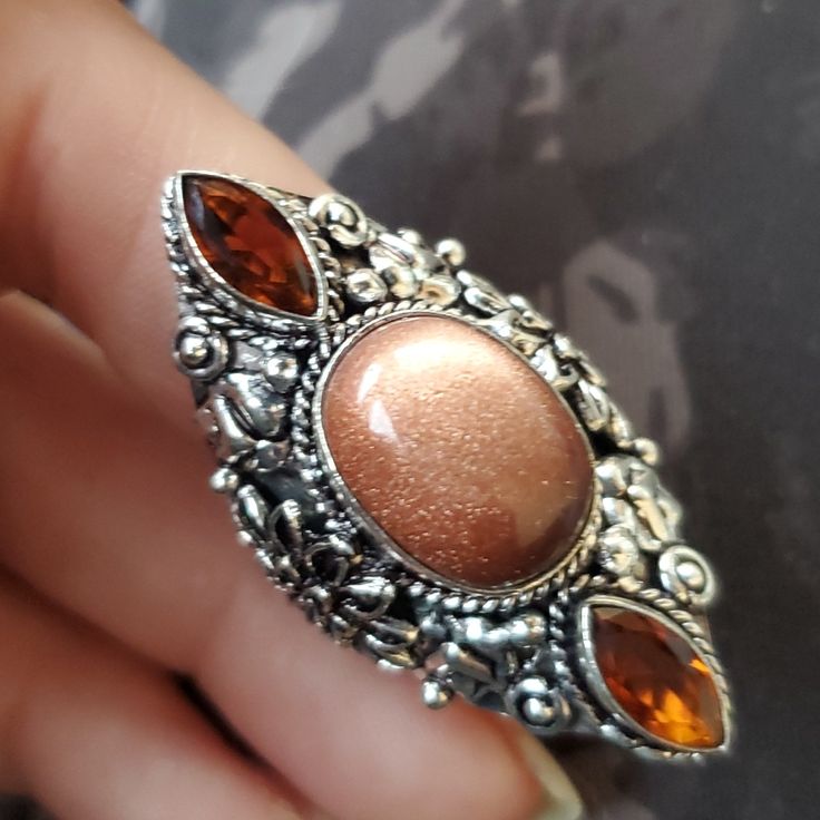 Brand New Handmade Sunstone Sun Sitara And Smoky Topaz Silver Statement Ring. Size 8 925 Stamped New To Poshmark? Use Referral Code Kimberlyn222 To Receive $10. Silver Sunstone Jewelry For Gift, Silver Sunstone Jewelry As A Gift, Spiritual Crystal Ring With Stone Setting, Spiritual Stone Setting Crystal Ring, Silver Citrine Jewelry With Accent Stones, Amber Topaz Jewelry, Dazzling Topaz Ring With Gemstone Accents As Gift, Silver Sunstone Jewelry With Gemstone, Amber Rings With Gemstone Accents For Gifts