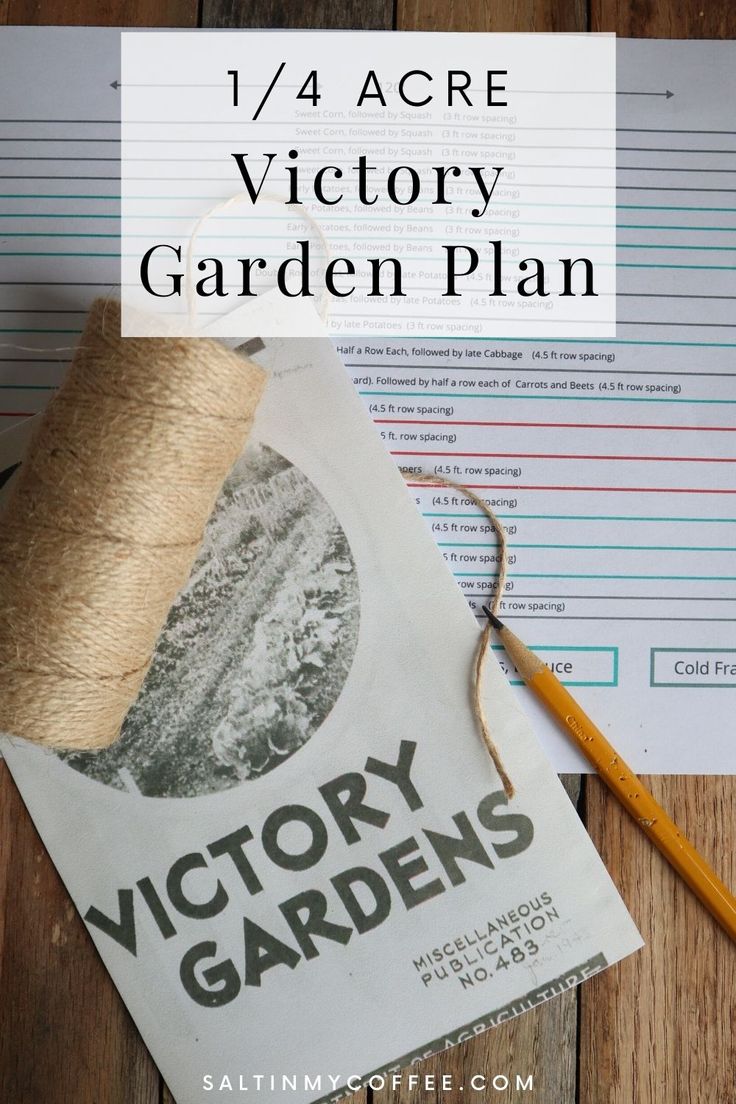 the victory garden plan is on top of a wooden table with yarn, scissors and paper