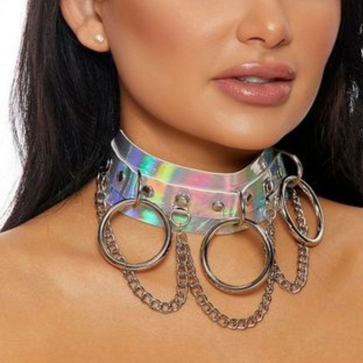 This Holographic Necklace Features Chains And Rings That Hang From It - A Unique And Glistening Accessory That'll Have U Rocking It At Ur Next Music Fest. Chained - Chains Add Spicy Details To This Choker Shine - Holograms So You Can Shine Set Includes: Choker Holographic Choker, Free People Necklace, O Ring Choker, Red Headband, Miyuki Bracelet, Collar Choker, Music Fest, White Headband, Tourmaline Necklace