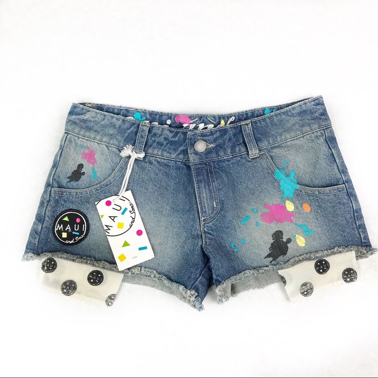 Size: 3 Juniors Style: Distress Denim, Cut Off/Frayed, 5-Pocket, Zipper Fly, Colorful "Paint Splashes" On Front And Back, Logo Patch, Front Pockets Are Visible From The Bottom Of The Shorts. Wash: Medium Wash Materials: 100% Cotton Measurements (Approximate) Waist (Laying Flat): 15" Inseam: 2" Rise: 7" Condition: New With Tag. Never Been Worn. Excellent Condition. Defect: Minor Tear On Back, Right Side, By Bottom Hem, About 1.5 Inches. (Please See Photos.) Playful Denim Blue Jeans For Summer, Cute Cotton Jeans For Summer, Cute Summer Cotton Jeans, Playful Denim Blue Bottoms, Playful Denim Blue Bottoms For Spring, Playful Blue Jean Shorts For Spring, Playful Medium Wash Bottoms For Spring, Playful Spring Jean Shorts, Playful Denim Shorts