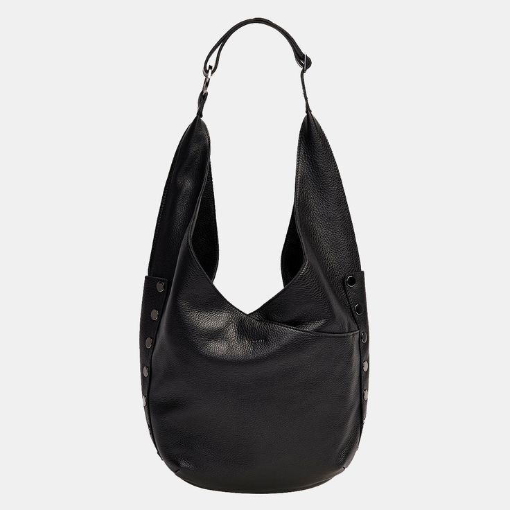 An updated version of everyone's favorite hobo bag has entered the chat; meet our updated Tom. With a zippered main compartment and adjustable strap, this shoulder bag still resembles the original, with pockets galore and a slouchy nature, making it extra roomy and the ultimate catch all bag. Crafted with classic black pebbled leather. Crafted with soft pebbled leather Gunmetal hardware, functionality covered for life Red cotton twill lining Exterior: side panels, crisscross drop pockets on fron Gunmetal Hardware, Black Pebbles, Fashion 2024, Black Leather Bags, Side Panels, Leather Tote Bag, Vintage Tags, Hobo Bag, Panel Siding