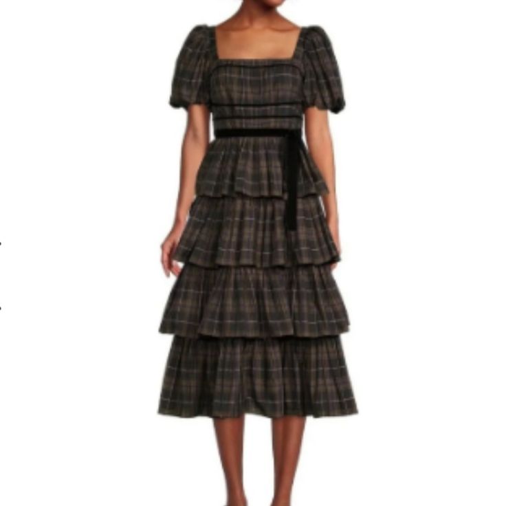 From Antonio Melani, This Dress Features: Plaid Taffeta Fabrication Square Neckline Short Puff Sleeves Tiered Skirt Velvet Self-Tie Sash At Waist Invisible Zipper/Hook & Eye Closure At Center Back Approx. 47" From Shoulder To Hem Length Polyester/Elastane Dry Clean Only Pit-Pit:40' Fall Puff Sleeve Dress With Ruffles And Short Sleeves, Fall Tiered Midi Dress For Daytime, Daywear Puff Sleeve Dress With Tiered Skirt And Ruffles, Daywear Puff Sleeve Tiered Dress With Ruffles, Daywear Puff Sleeve Dress With Ruffles And Tiered Skirt, Puff Sleeve Tiered Dress With Ruffles For Daywear, Tiered Puff Sleeve Dress With Ruffles For Daywear, Fall Tiered Ruffle Dress, Elegant Fitted Tiered Dress With Puff Sleeves