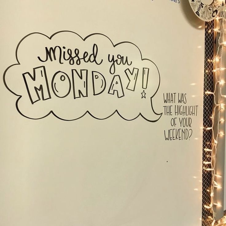 a white board with the words missed you monday written on it and lights around it