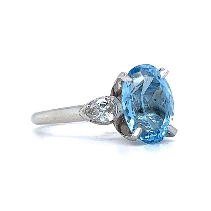 Santa Maria Aquamarine Diamond Ring in Platinum. Aquamarine stones are mined in locations all around the globe but some of the finest gem specimens are found in Brazil. In fact, it was in the Santa Maria de Itabira mine in Menas Gerais, Brazil, where the original aquamarine gemstone possessing a unique, deeply saturated blue hue was discovered. That is why aquamarine stones with such a color are now dubbed ‘Santa Maria,’ regardless of their origin. This beauty is flanked by glittering diamonds o Oval Platinum Gemstone With Center Stone, Exquisite Oval Platinum Gemstones, Fine Multi-stone Platinum Gemstones, Platinum Multi-stone Gemstones In Fine Jewelry Style, Fine Jewelry Platinum Multi-stone Gemstones, Classic Oval Platinum Gemstones, Oval Sapphire Gemstone With Multi-stone Detail, Oval Multi-stone Sapphire Gemstones, Fine Jewelry Diamond Gemstones With Polished Finish