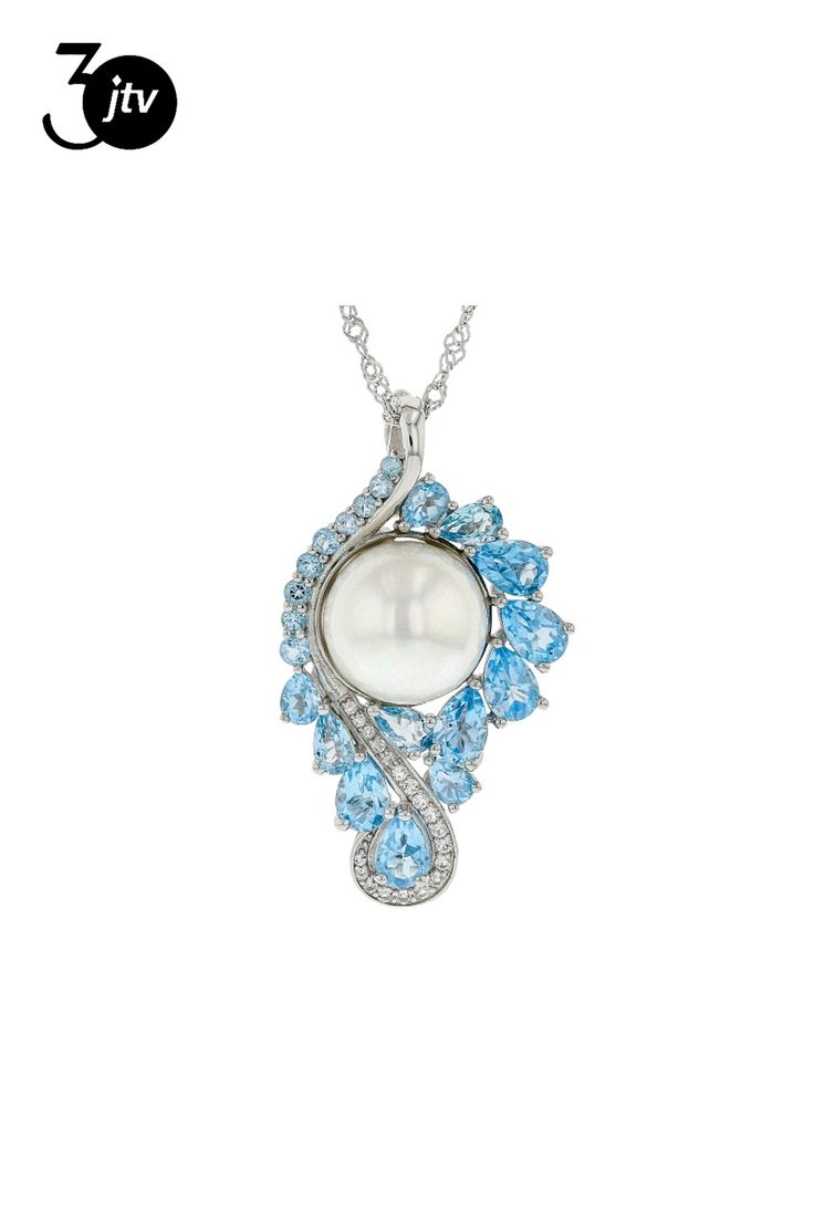 12mm white cultured freshwater pearl with 4.45ctw Swiss blue topaz and 0.17ctw white topaz rhodium over sterling silver brooch enhancer with 18 inch chain plus 2 inch extender. Measures approximately 1 1/2" L x 13/16" W with a 3.5mm bail. Can be worn as an enhancer with chain or as a brooch. Chain measures approximately 1/32 of an inch in width and has a lobster claw clasp closure. Colors, shapes and sizes may vary. White Blue Topaz Jewelry With Diamond Accents, Luxury White Blue Topaz Jewelry, White Gold Multi-stone Blue Topaz Jewelry, White Gold Blue Topaz Multi-stone Jewelry, Formal White Blue Topaz Jewelry, White Blue Topaz Gemstone Jewelry, Elegant White Blue Topaz Jewelry, Sterling Silver Brooch, Swiss Blue Topaz