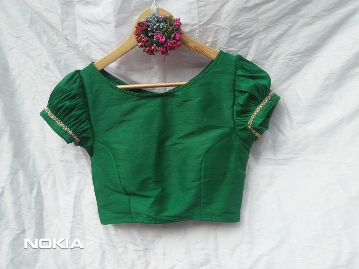 Designer Sari Blouse, Bollywood Blouse, Green Saree Blouse, Crop Top For Women, Ruffle sleeves Bollywood Blouse, Fancy Saree blouse, Blouses Description: Fabric: Banarasi silk Color: Same As Pic Available in every color Green Fitted Top With Gathered Sleeves, Fitted Green Blouse With Gathered Sleeves, Green Blouse With Balloon Sleeves, Fitted Blouse With Balloon Elastic Sleeves, Elegant Green Cotton Blouse, Fitted Green Blouse With Short Sleeves, Green Fitted Blouse With Balloon Sleeves, Fitted Green Short Sleeve Blouse, Fitted Blouse With Gathered Bishop Sleeves