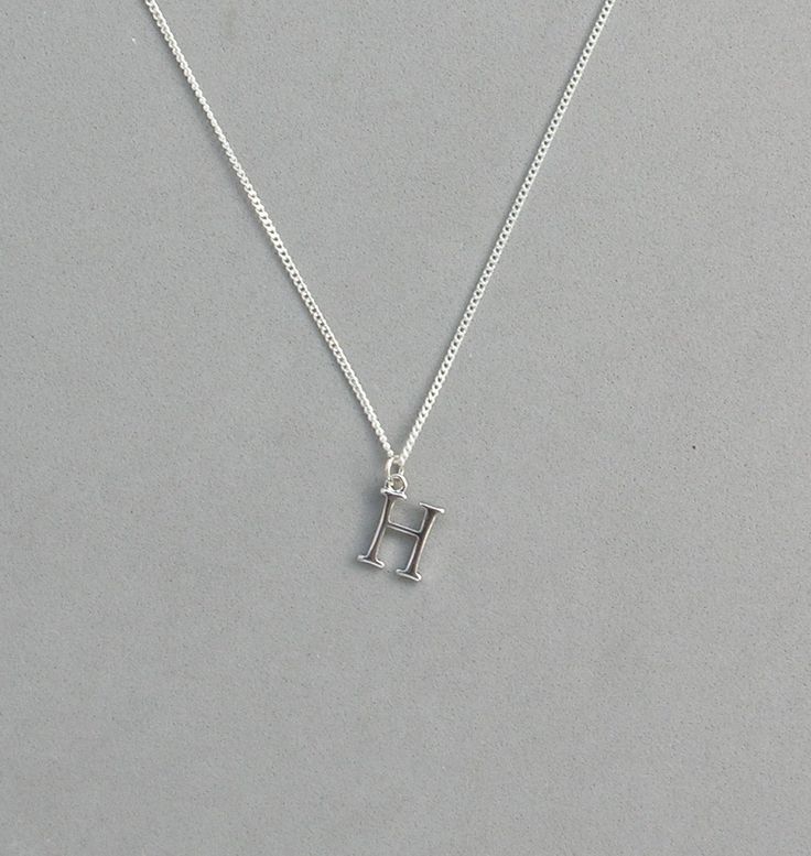 The initial is silver plated and measures 10 mm x 15 mm. It is strung on a silver plated tiny 1.3 mm curb chain with a lobster clasp closure. Choose the length from the drop down. To add a birthstone charm to this necklace, follow link below to purchase birthstone charm. https://www.etsy.com/listing/634099372/add-a-birthstone-charm?ga_search_query=add&ref=shop_items_search_1 Everyday Hypoallergenic Silver Charm Necklaces, Silver Hypoallergenic Charm Necklace With Initial Pendant, Silver Hypoallergenic Initial Pendant Charm Necklace, Silver Hypoallergenic Initial Pendant Charm Necklaces, Classic Silver Charm Necklaces With Initials, Silver Hypoallergenic Initial Pendant Jewelry, Hypoallergenic Silver Initial Pendant Charm Necklaces, Hypoallergenic Silver Charm Necklace With Initial Pendant, Silver Initial Pendant Charm Necklace Nickel Free