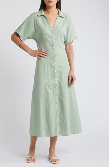 Coming in an airy linen woven with Lenzing™ EcoVero™ viscose, this shirtdress has a point collar and oversized short sleeves. Designed with a body-skimming fit, this midi has buttons along the front for easy on-and-off. 50 1/2" length (size 8) Front button closure Point collar Short sleeves Unlined 55% linen, 45% Lenzing™ EcoVero™ viscose Lenzing™ EcoVero™ viscose is a sustainably produced fiber using pulp made from renewable wood sources and certified with the EU Ecolabel for high environmental Contemporary Accessories, Water Usage, Designer Clothes For Men, Shirtdress, Comfortable Dress, Toddler Girl Outfits, Women's Summer Fashion, Toddler Sizes, Dress Romper