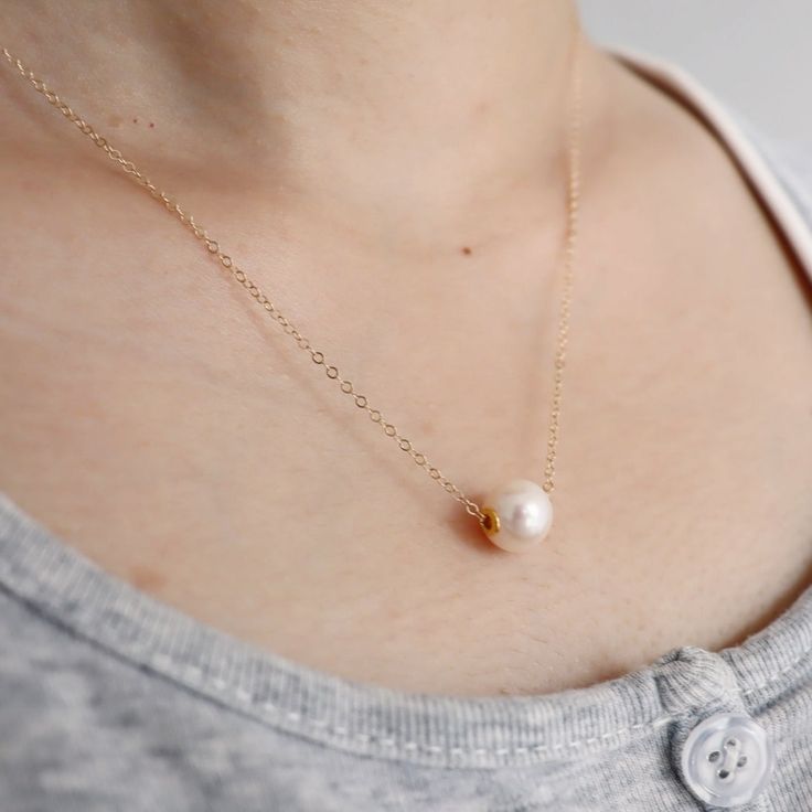 Product Details Process: 14K gold-filled Material: natural pearl （8.5-9mm) Size: The inner circumference of C necklace is 44cm (freely adjustable length) Weight: A about 2g, B about 1.9g, C about 1.7g, D about 1.5g Classic Gold Pearl Necklace For Formal Occasions, Gold Pearl Necklace For Formal Occasions, Akoya Pearl Embellished Jewelry Gift, Dainty Round Beads Pearl Necklace For Formal Occasions, Elegant Gold Necklaces With High Luster, Elegant Gold Pearl Chain Necklace, Elegant Gold Necklace With High Luster, Elegant Pearl White Necklace As Gift, Dainty Pearl Charm Necklace For Formal Occasions