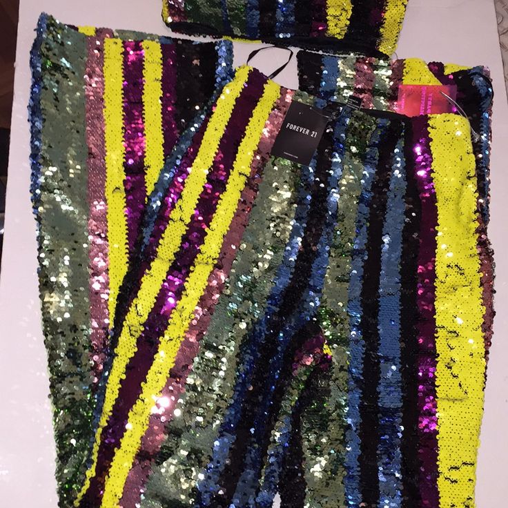 Brand New Multicolor Sequined Party Bottoms, Multicolor Sequined Bottoms For Party Season, Disco Style Multicolor Party Bottoms, Multicolor Disco Party Bottoms, Multicolor Stretch Bottoms For Night Out, Multicolor Stretch Pants For Party, Multicolor Bottoms For Night Out Party Season, Stretch Multicolor Pants For Party, Multicolor Bottoms For Party Season Night Out