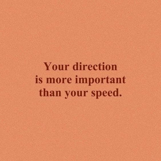 an orange background with the words your direction is more important than your speed